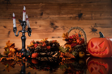 Halloween theme. Pumpkins on dark wooden background. 