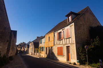 Fototapeta na wymiar View of ancient half-timbered residential houses in old town of Provins on sunny summer day, France..