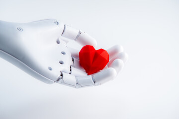 Robot hand holding red heart,white background