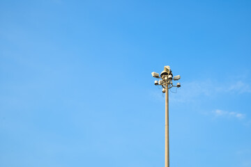lamp post against blue sky