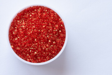 Red Sugar Crystals in a Bowl