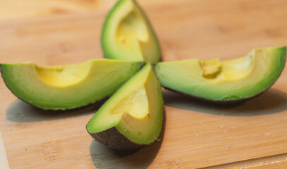 avocado cut in four pieces 
