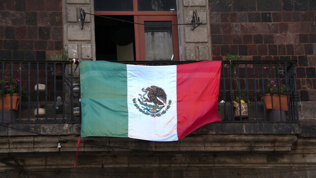 Mexican flag on a building near the Zocalo in Mexico City