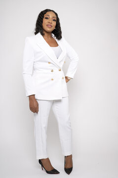 Young African-American Businesswoman in White Suit