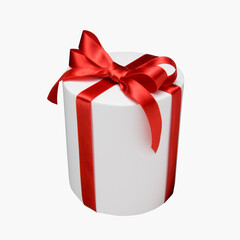 Gift box decorated with red ribbon.