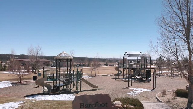 Barefoot Park in Colorado Midwest America • Playground Equipment with No Children Playing • Aerial Drone Shot • Horizontal HD Footage