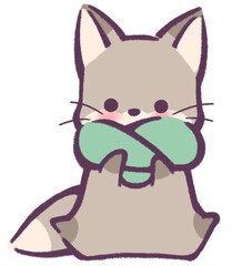 マフラーを巻いた座っているきつね