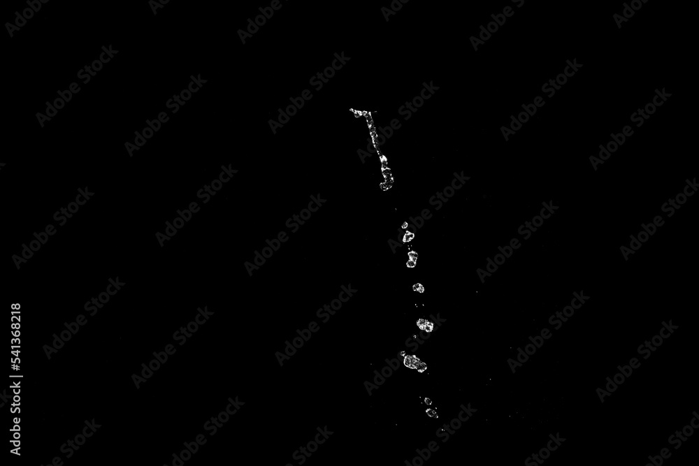 Poster water splashes isolated on black background. white jets with drops