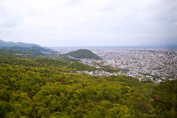 Fototapeta na wymiar Cityscape of Sapporo, Hokkaido, Japan, from Mt. Moiwa.