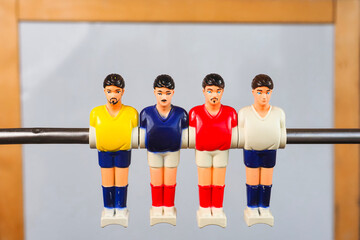 Obraz premium foosball players team plastic toy close up