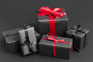 Gifts on dark background. Black Friday sale