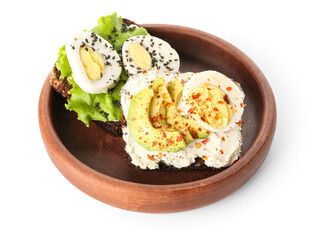 Bowl and toasts with boiled egg on white background
