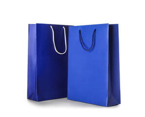 Blue shopping bags on white background. Black Friday sale