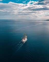 Vertical shot of a Mexican boat sailing in the sea