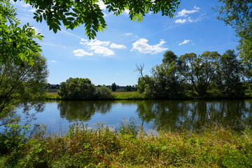 Fototapeta na wymiar Landscape at the Fulda. Nature by the river. 
