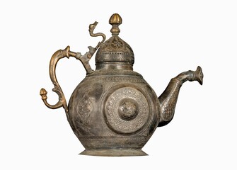 Antique metal teapot with artistic chasing and engraving on a white background