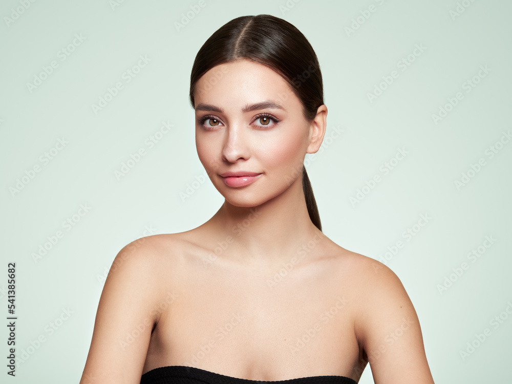 Wall mural beautiful young woman with clean fresh skin look away. girl beauty face care. facial treatment. cosm