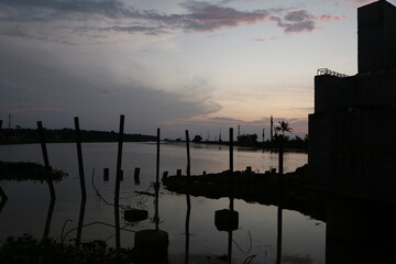 sunset over the river in country side