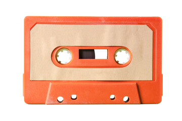 Isolated old vintage cassette tape from the 1980s (obsolete music technology). Vivid colors: dark orange plastic body, sand pale pink label.
