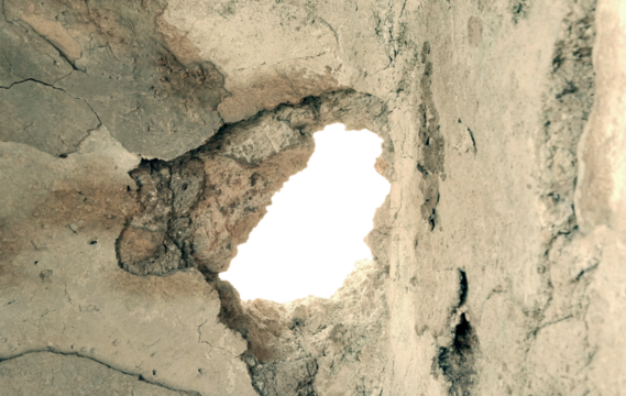 An empty hole (blank pixels) inside an old ruined wall. Fill the void with your own ideas.
