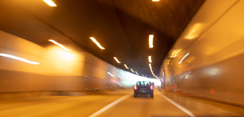 Car in the tunnel in motion.
