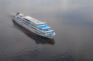 Aerial view of cruise ship sailing on sea