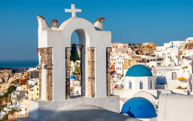 Bell tower at a Greek Orthodox church in Oia town on Santorini island