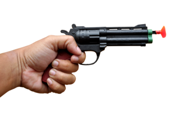 Hand holding toy gun on transparent background