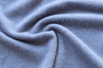 Simple knitted cashmere fabric, detail of warm clothes.