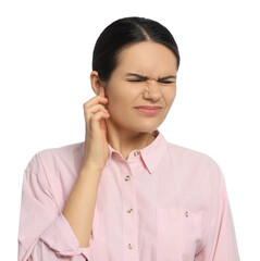 Young woman suffering from ear pain on white background