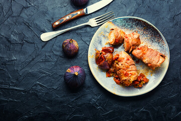 Appetizing meat fried with figs