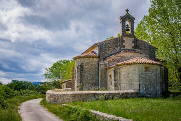 View on the medieval chapel of Notre Dame D'Aleyrac in the middle of vineyards in the South of France (Herault)