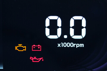 Digital tachometer and various warning lights in a new vehicle