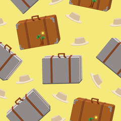 Seamless pattern of packed suitcases and hats on a yellow background.Vector pattern for tourist designs.