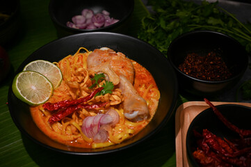 Khao Soi Kai, Traditional Thai chicken curry with egg noodles soup. Northern Thai food