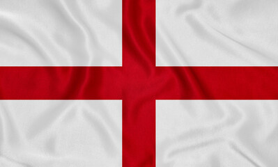 English waving flag. England St George's Cross flag on silk. English flag as a background.