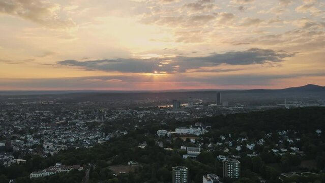 Aerial view of the city Bonn in Germany at the sunset with some clouds in the sky