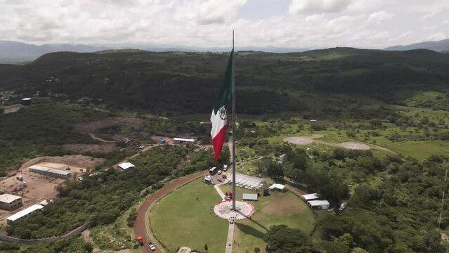 Aerial time lapse orbit around Mexico Independence flag in Iguala Guerrero