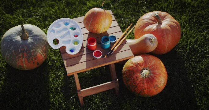 Several pumpkins and a drawing kit - everything is ready to paint the decorations for Halloween