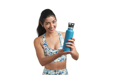 Young Venezuelan sportswoman smiling and looking at camera with a water bottle. Isolated over white background.