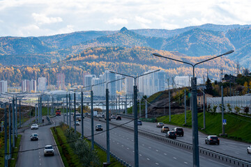 Wide multi-lane highway in the city. Russia Krasnoyarsk October 2022.