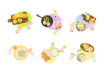 Fototapeta premium Top view of served breakfast dishes and people hands holding cutleries set. Pancakes, ham, sausage and eggs, oatmeal, waffles cartoon vector illustration