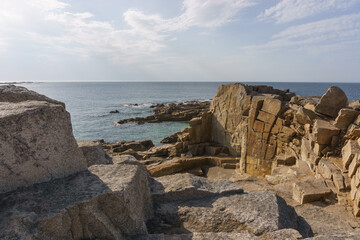 Bizarre sharp rock formation at Pointe de Castel Erek at the coast of the Cote de Granit Rose near...