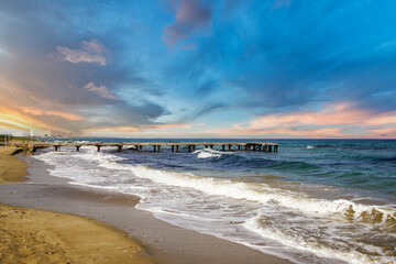 cyprus, Beach, waves and old wooden pier next to the ancient city of Salamis. cyprus beach and beach. 