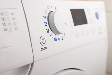 dashboard white washing machine close-up