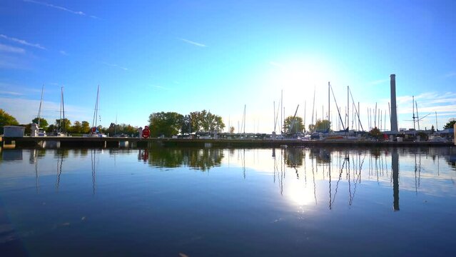 Ashbridges Bay Yacht Club with docked boats, vivid bright blue sky, Toronto