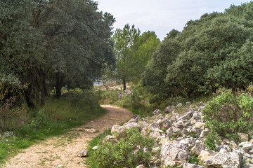 Los Arcs hiking path. a tourist route surrounded by greenery, mountains, valleys, natural rock bridges. Ruta and los Arcos de Castillos