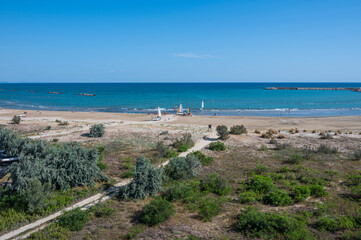 Fototapeta na wymiar Panorama of the beach of Pescara with Montesilvano in backgroud