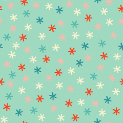 Cute retro snowflakes Christmas seamless pattern. Pastel blue, pink and cream winter holiday gift wrap design. Falling snow vintage background.