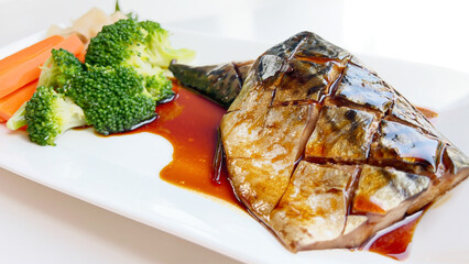 Close-up homemade saba shioyaki(Japanese style grilled mackerel with soy sauce.).